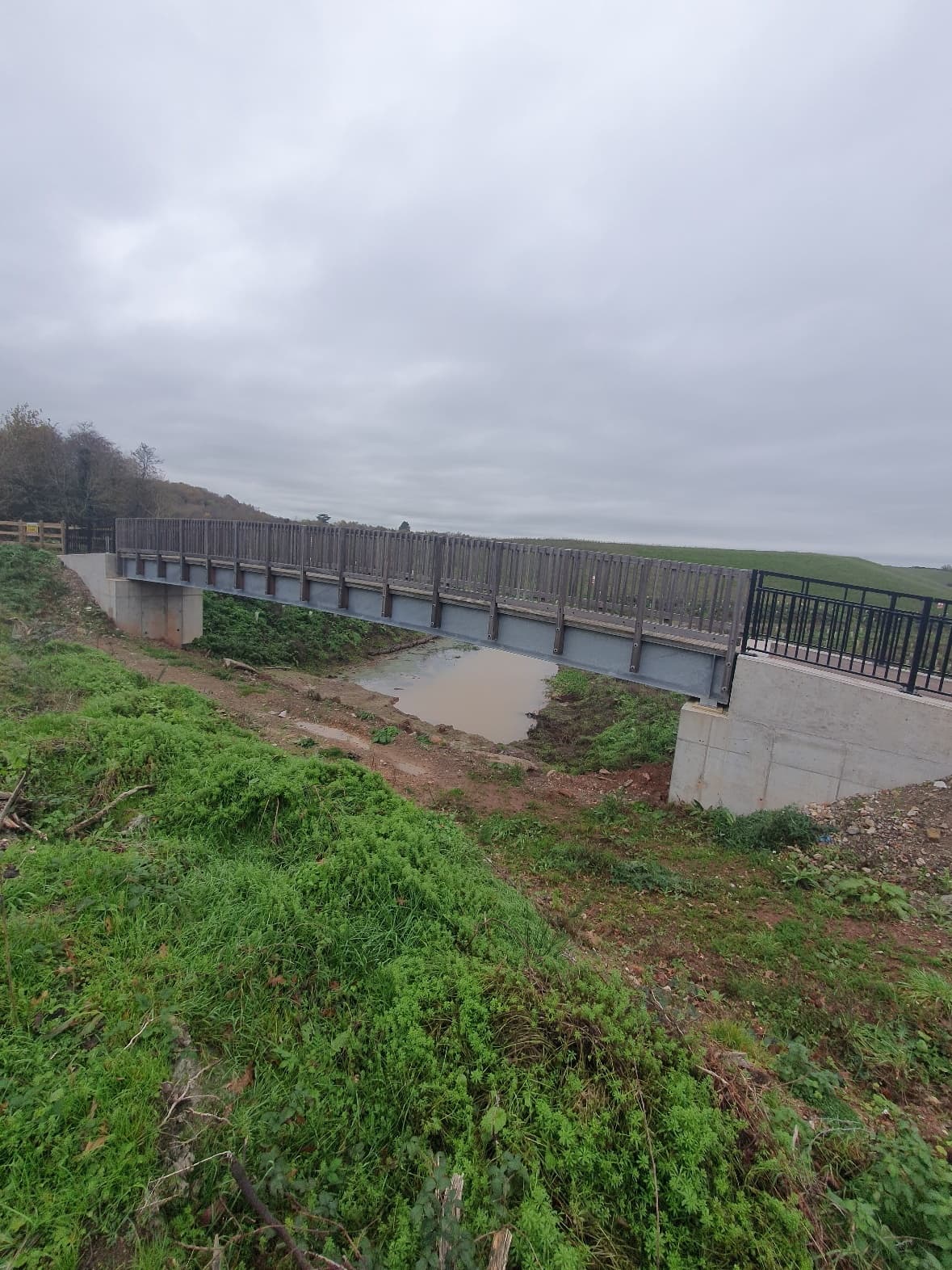 Sibelco bridge over Ugbrook Stream with concrete abutments